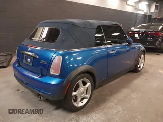 2005 MINI Convertible with VIN WMWRF33555TF63632, listed as a IAAI auction lot 42166640 with 102,559 mi miles and . Bid and sale history available at DreamBid. Image 4.
