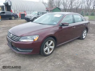 2013 Volkswagen Passat SE w/Sunroof with VIN 1VWBP7A32DC057999, listed as a IAAI auction lot 42040398 with 79,087 mi miles. Bid and sale history available at carsss.com. Image 2.
