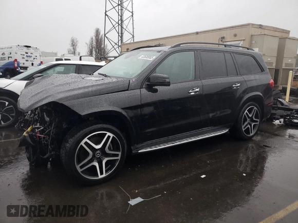 2018 Mercedes-Benz GLS 550 with VIN 4JGDF7DEXJB143439, listed as a Copart auction lot 43530955 with 98,405 mi miles and Salvage title. Bid and sale history available at DreamBid. Image 1.