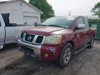 2004 Nissan Titan SE with VIN 1N6AA06A94N545539, listed as a IAAI auction lot 42036468 with 212,269 mi miles. Bid and sale history available at carsss.com. Image 2.