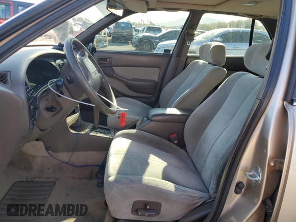 1994 Toyota Camry XLE with VIN JT2GK13E0R0017831, listed as a Copart auction lot 49887485 with 143,303 mi miles and Salvage Title. Bid and sale history available at carsss.com. Image 7.