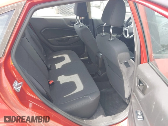 2018 Ford Fiesta SE z VIN 3FADP4BJ1JM132084, wystawiony jako IAAI lot #42296074 z przebiegiem 62 852 mil mil oraz . Historia ofert i sprzedaży dostępna na DreamBid. Obrazek 8.
