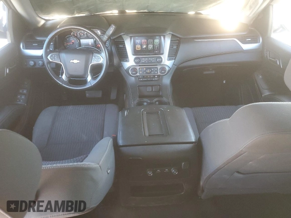 2018 Chevrolet Tahoe LS z VIN 1GNSKAKC1JR136870, wystawiony jako Copart lot #50523435 z przebiegiem 140 301 mil mil oraz Szkoda całkowita • Salvage title. Historia ofert i sprzedaży dostępna na DreamBid. Obrazek 8.