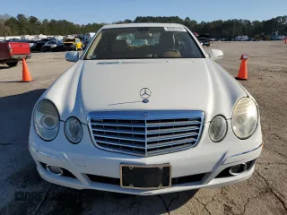 2007 Mercedes-Benz E 550 with VIN WDBUF72X37B021084, listed as a Copart auction lot 48695235 with 119,538 mi miles and Salvage Title. Bid and sale history available at DreamBid. Image 5.