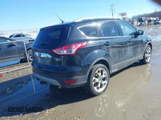 2015 Ford Escape Titanium with VIN 1FMCU9J91FUC68152, listed as a IAAI auction lot 41620725 with 195,122 mi miles. Bid and sale history available at carsss.com. Image 4.