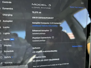 2018 Tesla Model 3 Long Range Battery with VIN 5YJ3E1EA8JF026497, listed as a IAAI auction lot 41987950 with 72,373 mi miles. Bid and sale history available at carsss.com. Image 7.
