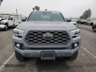 2021 Toyota Tacoma SR with VIN 3TMCZ5AN4MM402889, listed as a Copart auction lot 59942695 with 61,504 mi miles and Salvage title. Bid and sale history available at DreamBid. Image 5.