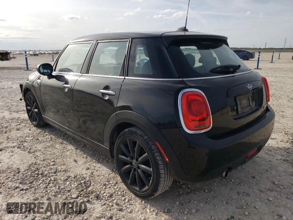 2021 MINI Hardtop 4 Door Oxford Edition with VIN WMWXU7C09M2N79553, listed as a Copart auction lot 84939724 with 59,139 mi miles and Salvage title. Bid and sale history available at DreamBid. Image 2.