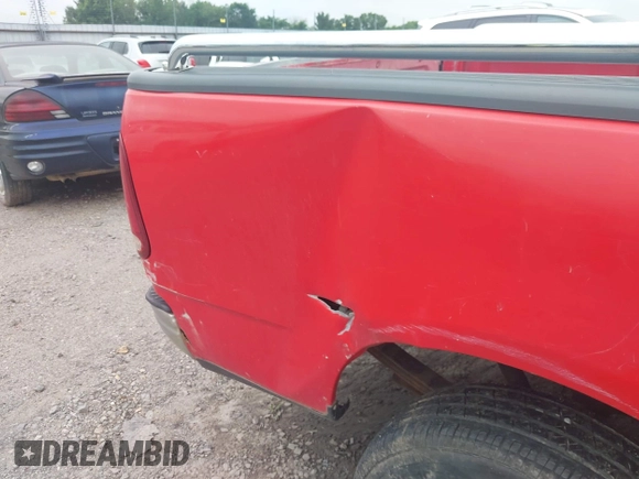 1997 Ford F-150 with VIN 1FTDX1724VKB63174, listed as a IAAI auction lot 42494621 with 205,978 mi miles and . Bid and sale history available at DreamBid. Image 12.