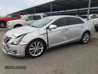 2014 Cadillac XTS Luxury with VIN 2G61M5S31E9217117, listed as a Copart auction lot 49659075 with 104,988 mi miles and Salvage Title. Bid and sale history available at DreamBid. Image 1.