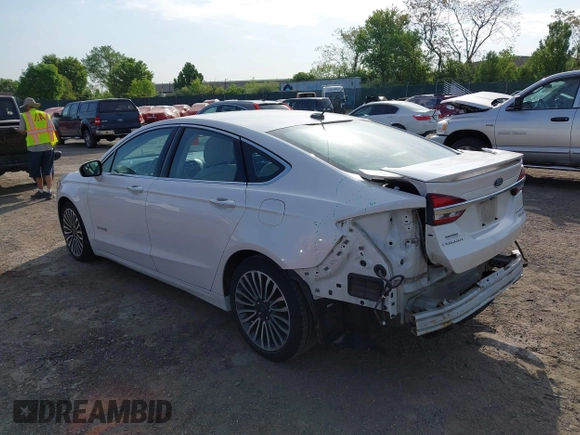 2017 Ford Fusion Hybrid Titanium с VIN 3FA6P0RU7HR148191, выставлен на аукционе IAAI как лот 42167708 с пробегом 72 708 миль миль и . История ставок и продаж доступна на DreamBid. Изображение 3.