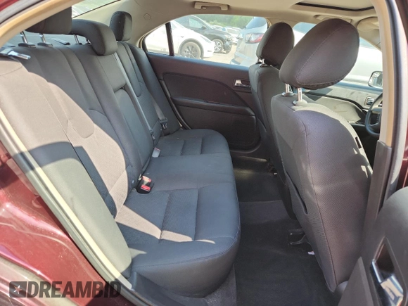 2012 Ford Fusion SE z VIN 3FAHP0HA7CR387524, wystawiony jako Copart lot #62083235 z przebiegiem 104 698 mil mil oraz Szkoda całkowita • Salvage title. Historia ofert i sprzedaży dostępna na DreamBid. Obrazek 10.