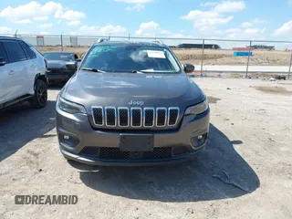 2021 Jeep Cherokee Latitude Lux with VIN 1C4PJMMX0MD235006, listed as a IAAI auction lot 42230915 with 76,264 mi miles and . Bid and sale history available at DreamBid. Image 12.