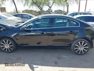 2015 Volvo S60 T5 Drive-E Premier z VIN YV140MFB3F2299721, wystawiony jako IAAI lot #42013732 z przebiegiem 82 407 mil mil oraz . Historia ofert i sprzedaży dostępna na DreamBid. Obrazek 14.