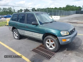 1999 Toyota RAV4 with VIN JT3GP10V4X7052720, listed as a IAAI auction lot 42490948 with 321,165 mi miles and . Bid and sale history available at DreamBid. Image 1.
