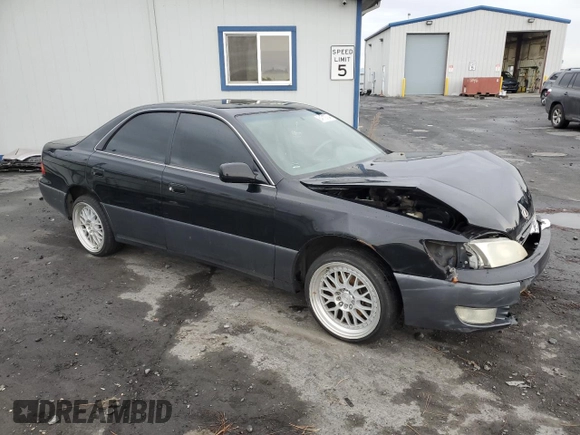1997 Lexus ES 300 Luxury Sport Sdn with VIN JT8BF22G5V0057703, listed as a Copart auction lot 84712734 with 160,575 mi miles and Salvage Title. Bid and sale history available at carsss.com. Image 4.