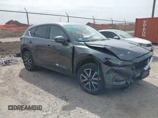 2018 Mazda CX-5 Grand Touring with VIN JM3KFBDMXJ0343777, listed as a IAAI auction lot 41741125 with 78,783 mi miles. Bid and sale history available at carsss.com. Image 1.