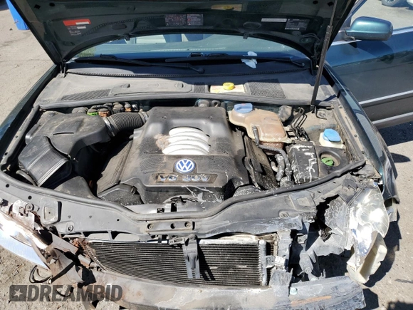 2002 Volkswagen Passat GLX z VIN WVWTH63B72P066013, wystawiony jako Copart lot #53750585 z przebiegiem 114 175 mil mil oraz Szkoda całkowita • Salvage title. Historia ofert i sprzedaży dostępna na DreamBid. Obrazek 11.