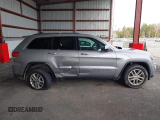 2018 Jeep Grand Cherokee Laredo E with VIN 1C4RJFAG7JC130313, listed as a IAAI auction lot 41969759 with 177,017 mi miles and . Bid and sale history available at DreamBid. Image 13.