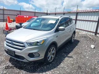 2017 Ford Escape Titanium with VIN 1FMCU0J99HUB23567, listed as a IAAI auction lot 42127795 with 93,056 mi miles. Bid and sale history available at carsss.com. Image 17.
