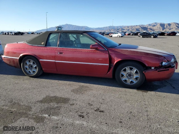 1999 Cadillac Eldorado with VIN 1G6EL12Y3XU606176, listed as a Copart auction lot 76889424 with 126,198 mi miles and Salvage Title. Bid and sale history available at carsss.com. Image 4.