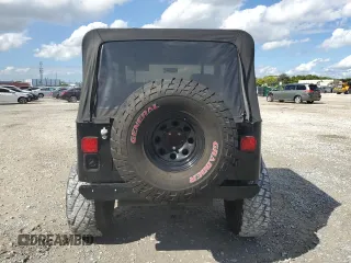 1991 Jeep Wrangler with VIN 2J4FY29S1MJ156667, listed as a Copart auction lot 75870604 with 144,399 mi miles and Clean Title. Bid and sale history available at carsss.com. Image 6.