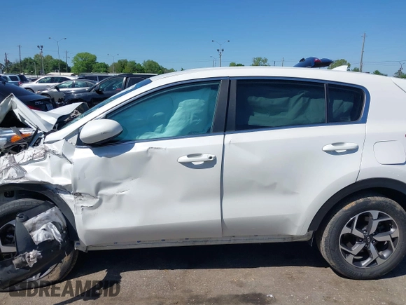 2021 Kia Sportage LX with VIN KNDPM3AC8M7932425, listed as a IAAI auction lot 39067549 with 56,841 mi miles. Bid and sale history available at carsss.com. Image 13.
