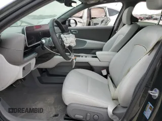 2023 Hyundai IONIQ 6 Limited with VIN KMHM54AA3PA032197, listed as a Copart auction lot 87769975 with 27,215 mi miles and Salvage Title. Bid and sale history available at carsss.com. Image 7.