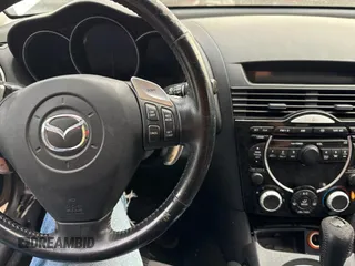 2004 Mazda RX-8 with VIN JM1FE17N540130784, listed as a Copart auction lot 76628734 with 122,806 mi miles and Clean Title. Bid and sale history available at carsss.com. Image 9.