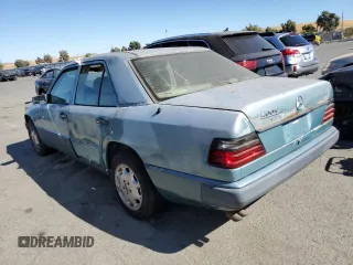 1992 Mercedes-Benz 400 with VIN WDBEA34E6NB743461, listed as a Copart auction lot 67982874 with 193,749 mi miles and Salvage Title. Bid and sale history available at carsss.com. Image 2.