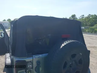 2014 Jeep Wrangler Sport with VIN 1C4AJWAG0EL126459, listed as a IAAI auction lot 42286803 with 179,025 mi miles and . Bid and sale history available at DreamBid. Image 6.