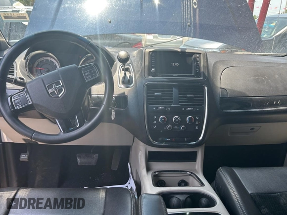 2014 Dodge Grand Caravan SXT with VIN 2C4RDGCG1ER308403, listed as a Copart auction lot 56712885 with 131,847 mi miles and Clean Title. Bid and sale history available at DreamBid. Image 9.