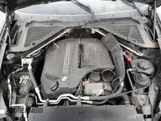 2012 BMW X5 35i with VIN 5UXZV4C59CL763577, listed as a Copart auction lot 62496155 with 148,240 mi miles and Clean title. Bid and sale history available at DreamBid. Image 12.