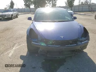 2023 Tesla Model 3 Long Range with VIN 5YJ3E1EB3PF633070, listed as a Copart auction lot 48942545 with 38,332 mi miles and Salvage Title. Bid and sale history available at DreamBid. Image 10.