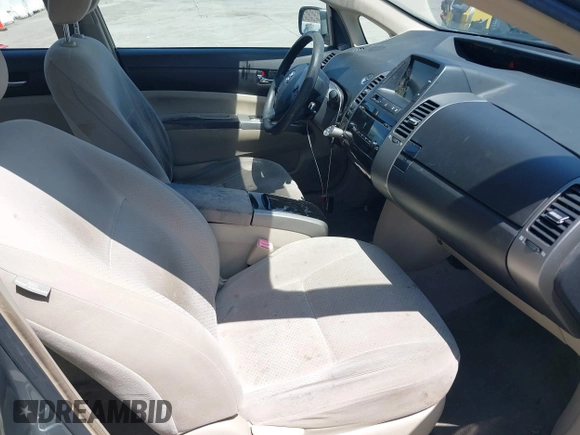 2005 Toyota Prius with VIN JTDKB20U553008263, listed as a IAAI auction lot 42149210 with 235,510 mi miles. Bid and sale history available at carsss.com. Image 5.
