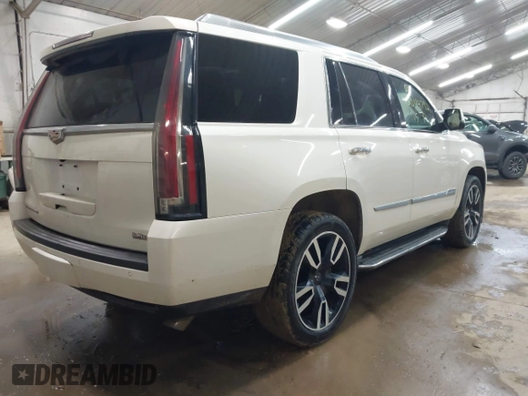 2015 Cadillac Escalade Luxury z VIN 1GYS4MKJ0FR566796, wystawiony jako IAAI lot #42044792 z przebiegiem 176 162 mil mil oraz . Historia ofert i sprzedaży dostępna na DreamBid. Obrazek 4.