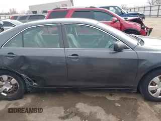 2009 Toyota Camry z VIN 4T1BE46K19U824701, wystawiony jako IAAI lot #41738779 z przebiegiem 225 469 mil mil oraz . Historia ofert i sprzedaży dostępna na DreamBid. Obrazek 13.