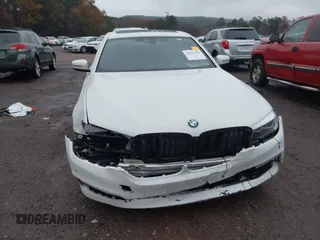 2018 BMW 5 Series 530e with VIN WBAJA9C52JB253501, listed as a IAAI auction lot 41010120 with 93,059 mi miles and . Bid and sale history available at DreamBid. Image 6.