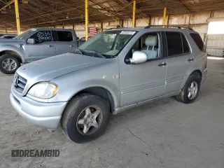 2000 Mercedes-Benz M 320/430/500 with VIN 4JGAB54E0YA159863, listed as a Copart auction lot 60355415 with 90,840 mi miles and Clean title. Bid and sale history available at DreamBid. Image 1.