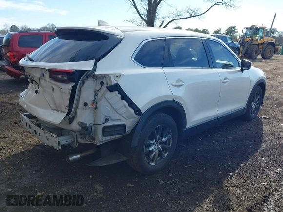 2016 Mazda CX-9 Touring with VIN JM3TCBCY4G0100511, listed as a IAAI auction lot 41811185 with 112,932 mi miles. Bid and sale history available at carsss.com. Image 4.
