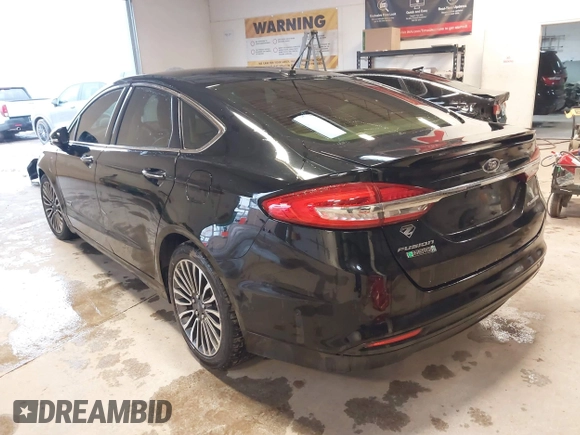 2017 Ford Fusion Titanium с VIN 3FA6P0SU8HR215570, выставлен на аукционе IAAI как лот 41427407 с пробегом 97 281 миль миль и . История ставок и продаж доступна на DreamBid. Изображение 3.