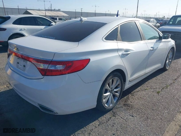 2012 Hyundai Azera with VIN KMHFG4JG5CA152696, listed as a IAAI auction lot 42009308 with 133,068 mi miles. Bid and sale history available at carsss.com. Image 4.