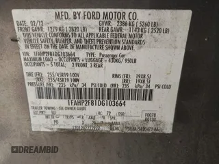 2013 Ford Taurus Limited z VIN 1FAHP2F81DG103664, wystawiony jako IAAI lot #42224957 z przebiegiem 167 911 mil mil oraz . Historia ofert i sprzedaży dostępna na DreamBid. Obrazek 9.