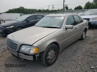 1998 Mercedes-Benz C 230/260/280/320 with VIN WDBHA23G8WA648546, listed as a Copart auction lot 60720975 with 110,926 mi miles and Salvage title. Bid and sale history available at DreamBid. Image 1.