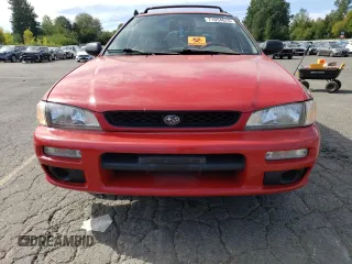1997 Subaru Impreza L with VIN JF1GF435XVH810083, listed as a Copart auction lot 71054674 with 155,322 mi miles and Salvage title. Bid and sale history available at DreamBid. Image 4.