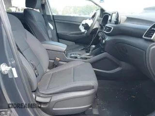 2021 Hyundai Tucson SE with VIN KM8J23A48MU379826, listed as a IAAI auction lot 41887834 with 51,885 mi miles and . Bid and sale history available at DreamBid. Image 5.