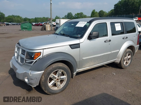 2010 Dodge Nitro SXT z VIN 1D4PU5GK8AW146087, wystawiony jako IAAI lot #42423104 z przebiegiem 220 381 mil mil oraz . Historia ofert i sprzedaży dostępna na DreamBid. Obrazek 17.