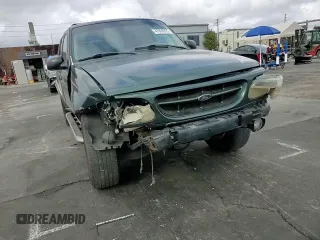 2000 Ford Explorer XLT z VIN 1FMZU73E9YZB18904, wystawiony jako Copart lot #47890925 z przebiegiem 248 363 mil mil oraz Szkoda całkowita • Salvage title. Historia ofert i sprzedaży dostępna na DreamBid. Obrazek 11.