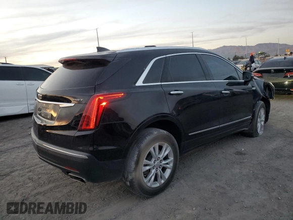 2021 Cadillac XT5 FWD Luxury with VIN 1GYKNAR45MZ109538, listed as a Copart auction lot 82933514 with 34,654 mi miles and Salvage Title. Bid and sale history available at carsss.com. Image 3.