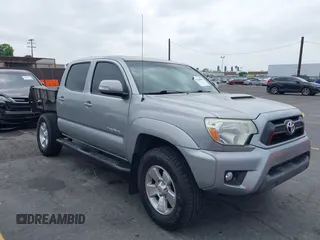 2014 Toyota Tacoma PreRunner with VIN 3TMJU4GNXEM164121, listed as a IAAI auction lot 42568581 with 201,316 mi miles and . Bid and sale history available at DreamBid. Image 1.